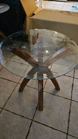Two matching  glass tables