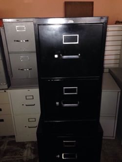 Many two drawer vertical filing cabinets in good condition