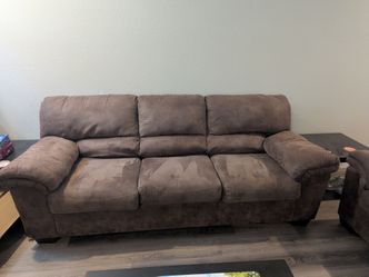 Brown  microfiber couch and loveseat set