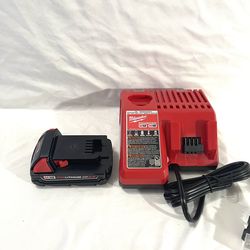 Brand new Milwaukee 2Ah battery, and new charger