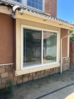 White Vinyl Sliding Window