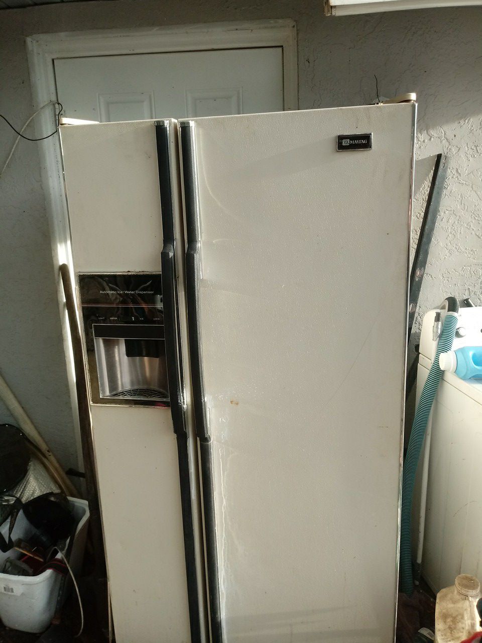 White side-by-side refrigerator with automatic ice maker