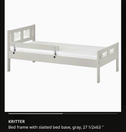 Toddler bed with mattress and comforter