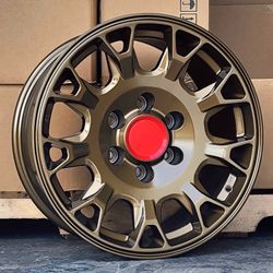17X8.0 EXTREME OE 6x139.7 LC / TACO CB GLOSS BRONZE METALIC WHEELS