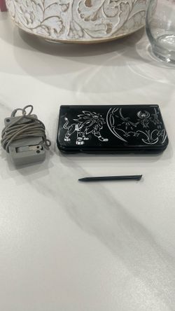 Nintendo 3DS XL sun and moon edition (with charger pencil) games are separate