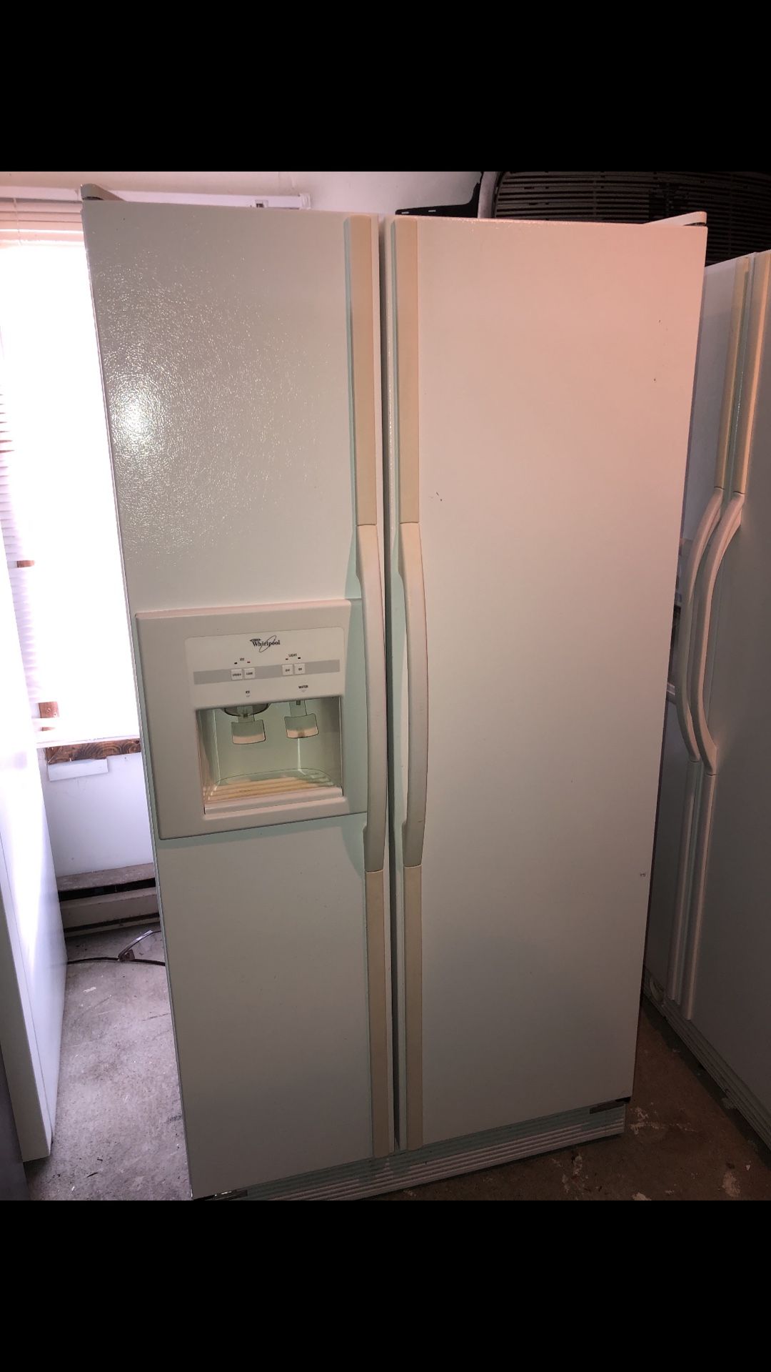 Whirlpool side by side refrigerator