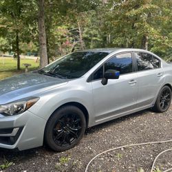 2016 Subaru Impreza. (92000)