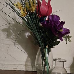 Two glass flower vase with artificial flowers for $3