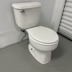 Sterling White Toilet w/ Round Seat - 1.6gpf