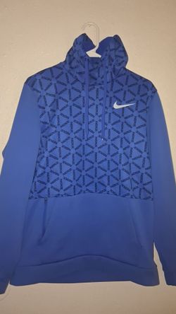 Nike NSW Men's Therma-FIT All Over Print Pullover Hoodie in blue.