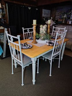 Vintage table with 4 iron chairs