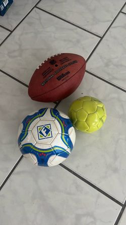 Wilson NFL Football and Two Soccer Balls