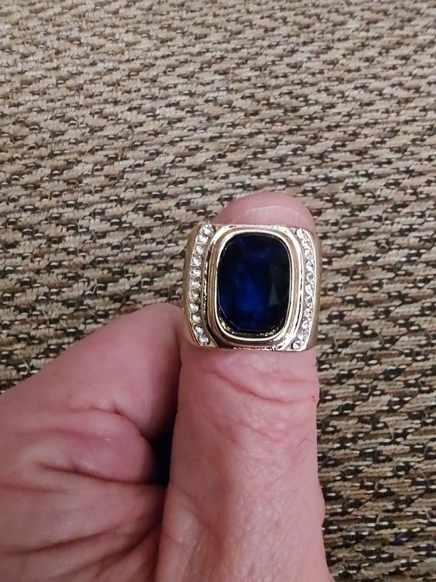 GOLD STAINLESS STEEL BLUE GEMSTONE, CZ RING. SIZE 10. NEW. PICKUP ONLY