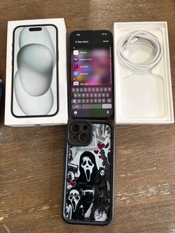 iPhone 15 ( complete in box ) with ghost face case