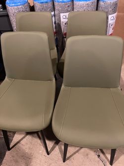4 Olive Green Faux Leather Upholstered Armless Dining Chairs W/Contrasting White Stitching And Dark Metal Legs. New. Never Been Used(See & Click On Pi