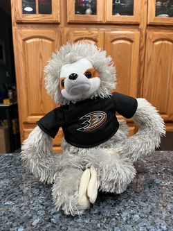 Collectible NHL Forever Plush Sloth In Anaheim Ducks T Shirt. Size Approximately 14 Inches Tall. Preowned very good condition .