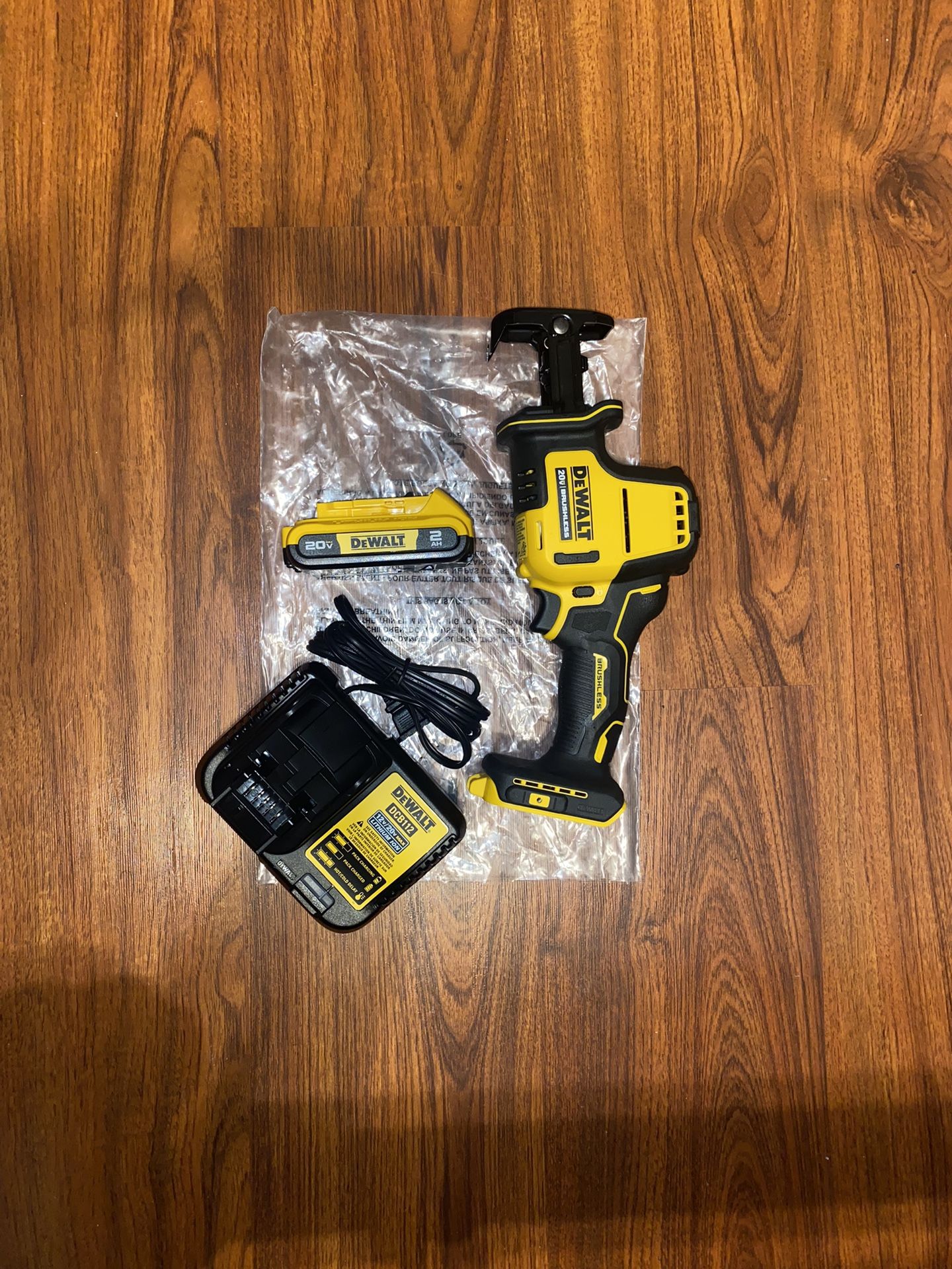 (1)Dewalt 20v Max Brushless Atomic Compact Reciprocating Saw (DCS369) (1) 2.0 Ah Battery (1) 12v/20v Charger