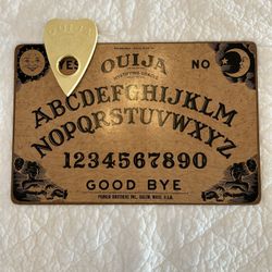 Vintage Ouija Board. Mystifying Oracle Board Game.