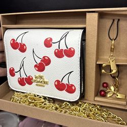 Cherry coach crossbody