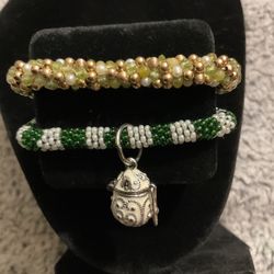 2 Beaded Stretch Bracelets/1 With Silver Latched Jar Charm