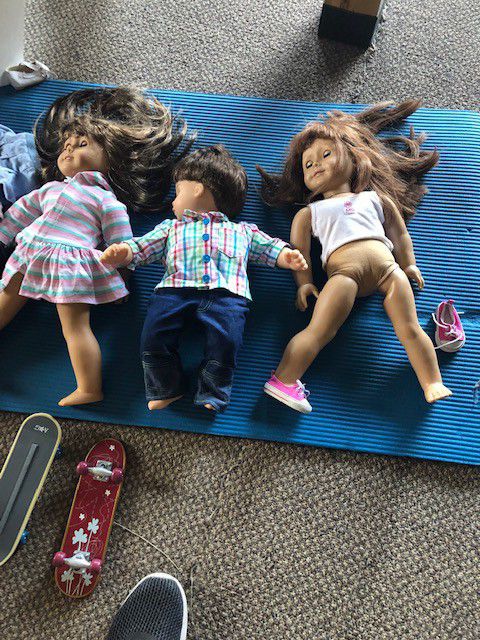 2 American Girl doll dolls and one american boy doll clothes