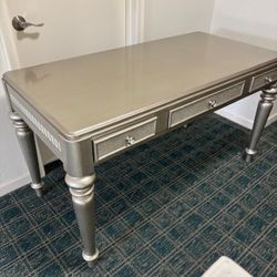 Fancy silver desk with glass knobs… 53” wide, 30” high , 26” depth . $150