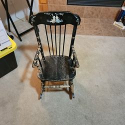 Vintage Ramsdell child's musical rocking chair.