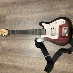 Ritmo Electric Guitar and Amp Speaker