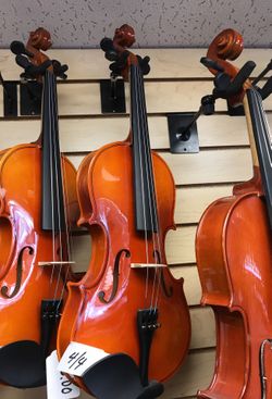4/4 violin new with case and bow $65