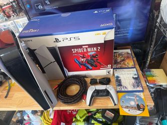 Sony PlayStation 5 Console Slim Disc Edition Marvels Spider-Man 2 W/ 3 Games Lot  The Sony PlayStation 5 Slim Disc Edition with Marvel's Spider-Man 2 
