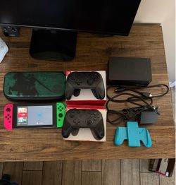 Nintendo Switch + 2 Pro Controllers