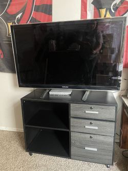 43” Samsung TV And Stand