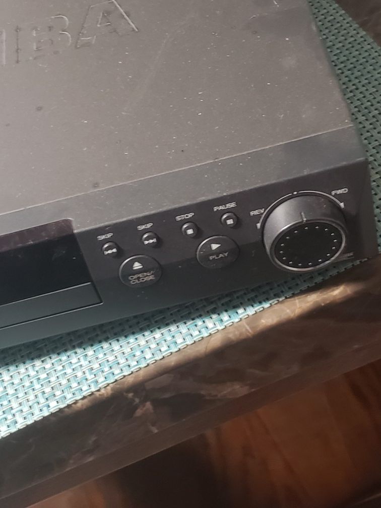 DVD player works perfect Toshiba 5 dollard