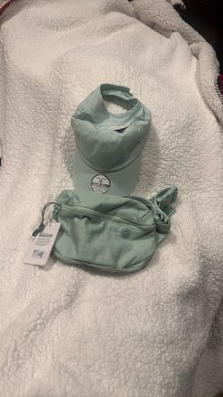brand new fanny pack and pony tail hat 