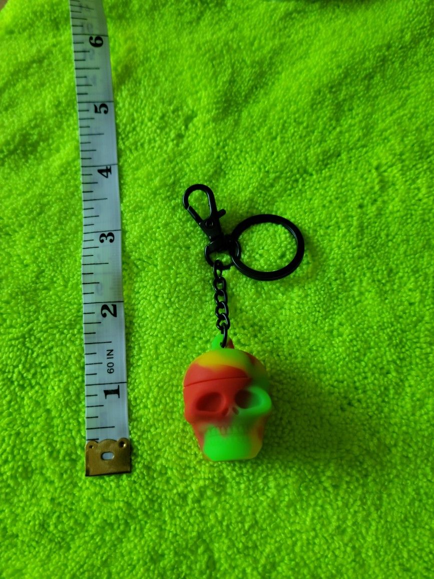 Matte Black Hardware 3ml Blue/Black Silicone Skull Storage Container Keychain