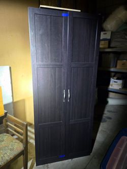 Sadder Storage Cabinet