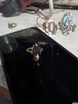 Gold-Tone Ring with Dark Oval Stone