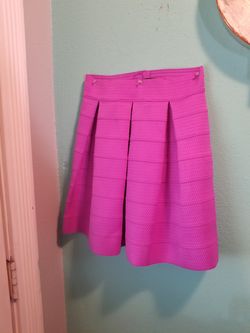 Cute purple skirt.. Above knee.. Size small... Cute!