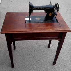 Antique Singer sewing machine solid wood table