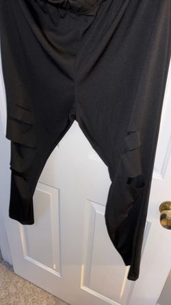 Stretchy black leggings with slits on legs