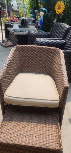 Brown  PE Wicker chair with ottoman and side table. Cushion included.