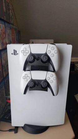 Used Sony PlayStation with games and pad