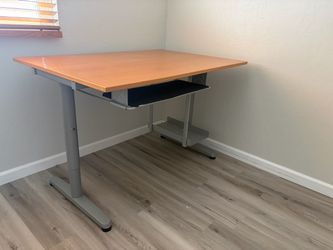 Adjustable height desk