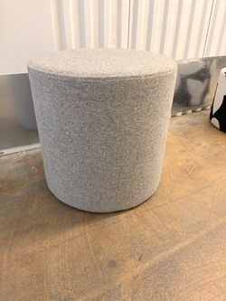 Modern Gray Round Ottoman / Pouf – Minimal & Versatile.