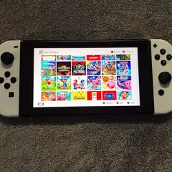 NINTENDO SWITCH with 100 Popular Switch Games Included