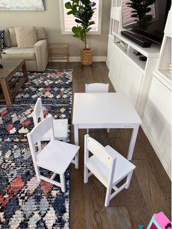 Kids white table with 4 chairs