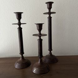 (3) vintage iron candle holders 