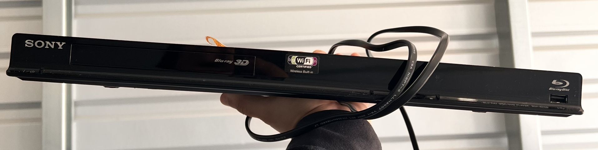 Sony Blue Ray 3D Player, And With 22 Assorted Movies .