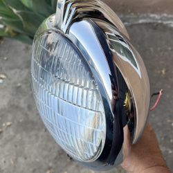 1930’s Car Passing Light