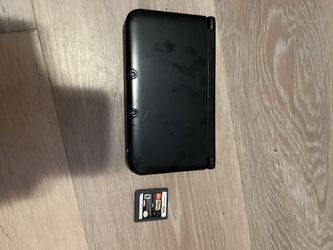 Nintendo 3DS XL with game